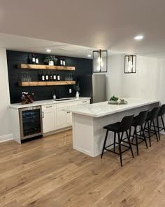 41 Amazing Finished Basement Ideas for Every Budget - Addicted To Organization Finished Basement With Black Ceiling, Basement Wet Bar Ideas, Modern Wet Bar, Basement Man Cave, Basement Rooms, Small Basement Kitchen, Basement Wet Bar, Basement Suite, House Basement