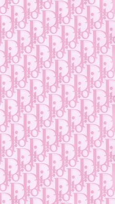 a pink and white pattern with skulls on it