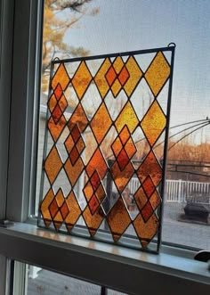 This panel has stained glass diamond shapes layered in a lattice pattern for a pretty layered effect. It was created by Graphix Glass on Etsy. www.graphixglass.com Stained Glass Hanging Art, Leaded Stained Glass Patterns, Mcm Stained Glass Windows, Large Stained Glass Panels, Boho Stained Glass Window, Simple Stained Glass Windows, Stained Glass Windows In Homes, Stained Glass Windows Patterns, Modern Stained Glass Windows