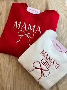 Personalized Embroidered Sweatshirt - Perfect gift for any special occasion These are 2 sweaters!  The kids sweaters are only available in white. If you would like to request a different color, please send a direct message to us.  - Unisex sizing. - 50% cotton / 50% Polyester - Air jet yarn , softer feel and reduced pilling *NOT PROVIDING ALL OF THE REQUIRED INFORMATION FOR PERSONALIZATION WILL DELAY YOUR ORDER.** Please include thread color. Colors may differ slightly from appearance on screen. Mama And Mini Sweatshirts, Embroidered Gifts Ideas, Embroidered Sweatshirt Ideas, Cute Mom Gifts, Personalized Valentines Gifts, Mama Embroidered Sweatshirt, Personalized Sweatshirts, Mom And Me Shirts, Embroidered Sweaters