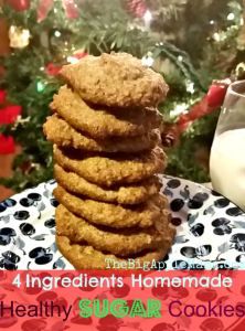 a stack of cookies sitting on top of a plate next to a glass of milk