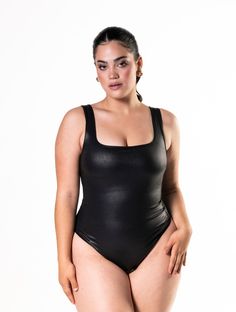 Become the center of attention with our Leather Snatched Bodysuit. Featuring gold print faux leather, four-way stretch, and an open crotch design for convenience. The double-layer fabric on the breast panel and compressive elastic mesh will shape your waist and abdomen. Perfect for parties, daily wear, and the office. Get ready to make a statement with this stylish and skin-friendly bodysuit. Shape Your Waist, Bra Dress, Curve Jeans, Shapewear Bodysuit, Swimwear Shorts, Gold Print, Zambia, Black Bodysuit, Summer Sale