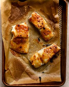 some food is laying on top of brown paper