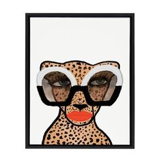 a framed art print with a woman's face wearing sunglasses and leopard print on it