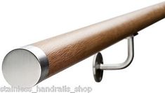 a close up of a metal and wood handle on a wall mounted coat rack with a white background