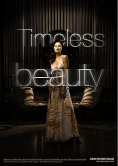 a woman standing in front of a couch with the words'timeless beauty '