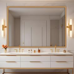 a bathroom with two sinks and a large mirror