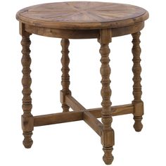 a round wooden table with turned legs