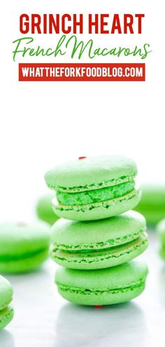 green macarons stacked on top of each other with the words grin heart french macaroons