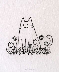 a black and white drawing of a cat sitting in the grass with flowers around it