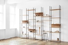 the shelves are made out of wood and metal