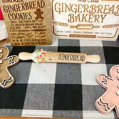 gingerbread cookies and cookie cutters on a table