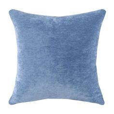 the blue velvet pillow is shown on a white background and has a soft, textured finish