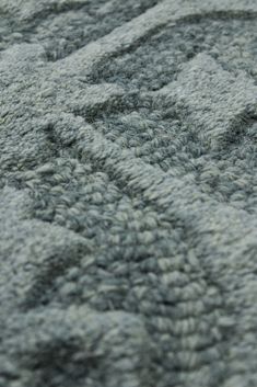 the texture of an area rug is very soft