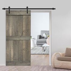 an open sliding barn door in a living room