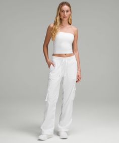 A pocket-forward favourite. This new version of our Dance Studio Pant has a roomier fit with added cargo and back pockets for hands-free storage. Designed for Casual. This new relaxed-fit version of our Dance Studio Pant feels roomier throughout the hips and thighs. Consider sizing down for a less relaxed fit:Full length intended to sit at ankle. Hand pockets with hidden card sleeve. Back pockets. Cargo pockets. Drawcord to customize fit. Cinchable hems let you adjust the look. Leg Work, Card Sleeve, Women Pants, Fashion Joggers, Cargo Pants Women, Cargo Pant, Dance Studio, New Version, Lululemon Women