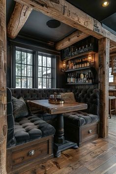 a living room filled with furniture and lots of windows