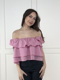 The To the Next Level Crop Top from Listicle will help you to climb to the next level in all your endeavors! This top features layered frill detail, a hi-lo hem, and a square neckline. Pair with your favorite shoes and keep climbing! Fabric: 86% Rayon, 11% Polyester, 3% Rayon Measurements: Bust (Size M): 18.5" Length (Size M): 19.5"/21.5" True To Size S 0-6 M 6-10 L 10-14 The Ladies of ALB Sizing: Model (long dark brown hair) is a size S, 33" bust, 34B bra size and is photographed in a size S! Model (medium length brown hair) is a size S, 32.5" bust, 32B bra size and is photographed in a size S! Spring Chic Crop Top With Ruffle Hem, Chic Spring Crop Top With Ruffle Hem, Trendy Off-shoulder Top With Ruffles For Day Out, Trendy Ruffled Off-shoulder Top For Day Out, Trendy Off-shoulder Ruffle Top For Day Out, Sleeveless Off-shoulder Top With Ruffles, Cropped Ruffle Hem Top For Day Out, Summer Off-shoulder Top With Ruffle Hem, Off-shoulder Tops With Ruffle Hem For Summer