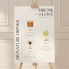 a sign with drinks on it that says drunk in love