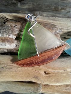 DISTINCTIVE SEA GLASS SAILBOAT PENDANT CREATED BY ARTIST GEOFFREY M. GOODMAN USING ONLY GENUINE CHESAPEAKE BAY SEA GLASS AND DRIFTWOOD. (ALSO Art Easy