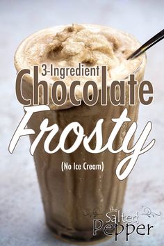 a chocolate frosty in a glass with a spoon on the side and text that reads 3 ingredient chocolate frosty no ice cream