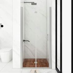 a bathroom with white walls and flooring has a glass shower door that opens up to the toilet