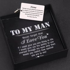 a black box with a keychain that says, to my man never forget that i love you