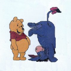 winnie the pooh and piglet cross - stitch pattern on white fabric with blue background