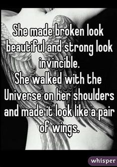 the back of a woman's chest with wings on it