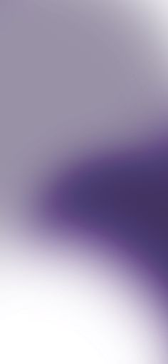 an abstract blurry background in purple and white