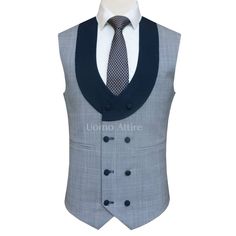 Professional Office Sets In Suiting Fabric, Office Wear Three-piece Suit With Single Button, Blue Slim Fit Double Breasted Suit, Blue Office Suit Set, Elegant Sleeveless Blue Suits, Elegant Blue Office Vest, Blue Slim Fit Three-piece Suit, Fitted Blue Office Wear Sets, Blue Slim Fit Tuxedo-style Three-piece Suit