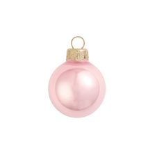 a pink christmas ornament hanging from a gold - plated metal hook on a white background