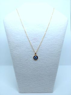 Evil Eye Pendants in Gold/Silver Tone. Cabochon bezel is hand-painted with Ultramarine Blue acrylic paint to enhance the charm. 12mm blue resin evil eye charm is resin set into alloy metal cabochon bezel. Chain length is 18 inches. Silver chain is stainless steel and gold chain is gold plated brass. Charm length and width is 1/2 inch. Has an upgraded lobster clasp closure on the back. Back of cabochon bezel is also coated in a protective UV gel to avoid tarnishing. Jewelry Cloth & Wear/Care Evil Eye Round Pendant Jewelry Gift, Blue Metal Charm Necklace With Round Pendant, Blue Metal Necklace With Evil Eye, Blue Metal Evil Eye Necklace, Evil Eye Metal Jewelry For Gifts, Metal Evil Eye Jewelry For Gift, Evil Eye Metal Jewelry Gift, Blue Evil Eye Metal Necklace, Blue Metal Jewelry