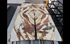 two pieces of marble sitting on top of each other