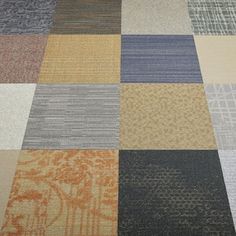 an assortment of different colored carpet samples