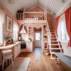 the interior of a small pink house with stairs