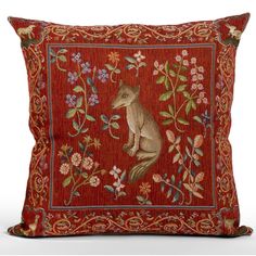 a red pillow with an animal on it