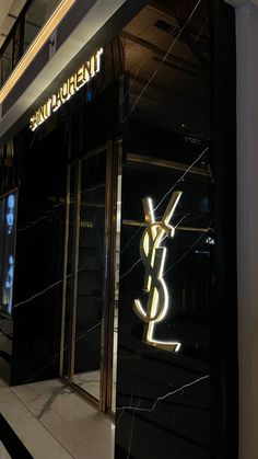 a store front with the words saint laurent on it