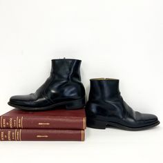 "Vintage 1960s mens leather chelsea boots featuring; a slightly squared off toe zip inside the ankle  1 1/4 inch heel with rubber cap smooth leather sole short shaft of a soft, supple leather with a bit of a sheen in jet black labeled \"The Florsheim Shop\" these are stamped a men's size 7 D on the inside , measurements taken inside the boot are; 10 1/4 inches from heel to toe 3 1/2 inches across the ball of the foot 2 3/4 inches across the heel of the foot in good, preworn, vintage condition wi Mens Heeled Boots, Wrangler Butts, Cuban Heel Boots, Men Leather Boots, Men In Heels, Chelsea Boots Men, Vintage Boots, Black Leather Shoes, Leather Chelsea Boots