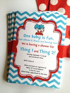 two dr seuss themed baby shower books with polka dots on the cover and one is blue and red