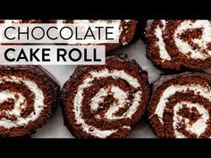 chocolate cake roll with white frosting on top and the words chocolate cake roll above it