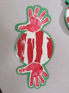 two hand prints on the back of a refrigerator