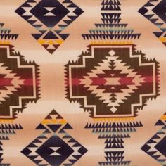 an old native american rug with many different colors and designs on it's sides