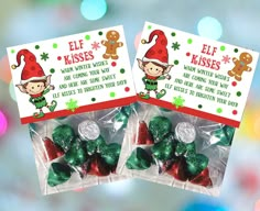 two christmas candy bags with elf kisses on them