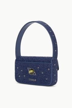 Updated in a beaded cabochon constellation pattern, our best-selling Tommy Bag is back in a colorful design against a deep navy background for the season. This style features a magnetic snap closer and exterior pocket at the back of the bag. Staud Bags, Soft Loafers, Custom Handbags, Flat Heel Boots, Navy Background, Sandal Platform, Shopping World, Crossbody Clutch, Beach Accessories