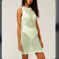 Feel Confident And Look Chic In The Carson Dress. Designed In Soft Tech Mesh, This Mini Silhouette Features A Solid White, High Neckline And A Straight Cut That Will Guarantee To Hug All Your Curves. Material 65% Viscose, 35% Nylon Light Green Beach Dress For Summer, Light Green Summer Beach Dress, Light Green Sundress For Summer, Light Green Sundress For The Beach, Light Green Sundress For Beach, Light Green Summer Vacation Dress, Light Green Beach Sundress, Light Green Fitted Casual Dress, Fitted Light Green Casual Dress