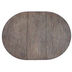 an oval wooden table top that is made out of wood planks and has been painted brown