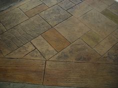 an image of a close up view of a stone floor that looks like it is made out of wood