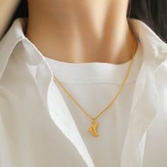 The croissant pendant is petite in size and exudes understated elegance, making it perfect for everyday wear. Whether worn alone as a sophisticated statement piece or layered with other necklaces for a more eclectic look, this necklace adds a unique and playful element to your style. Metal: 18K Recycled Gold Plated Vermeil on Recycled Sterling Silver/Recycled Sterling Silver Necklace length 410-465mm (pendant length 17mm) Weight: 6g Edison Pearls, Tiger Eye Stone, Understated Elegance, Recycled Gold, Recycled Sterling Silver, Sterling Silver Necklace, Necklace Length, Stone Necklace, Ring Bracelet