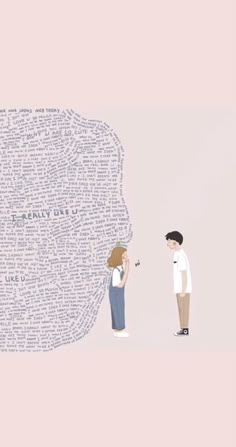 two people standing next to each other with words all over them